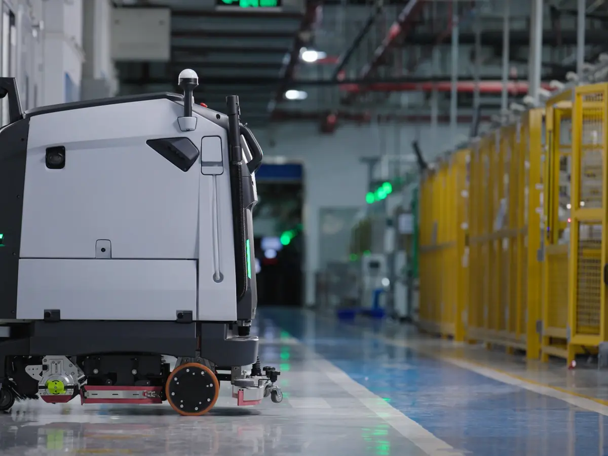 The PUDU BG1 at its filling, draining and charging station