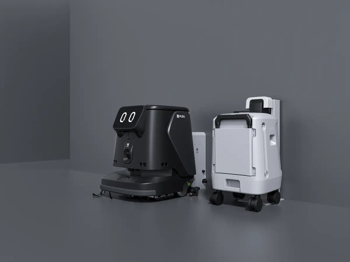 The PUDU CC1 Pro and its water station