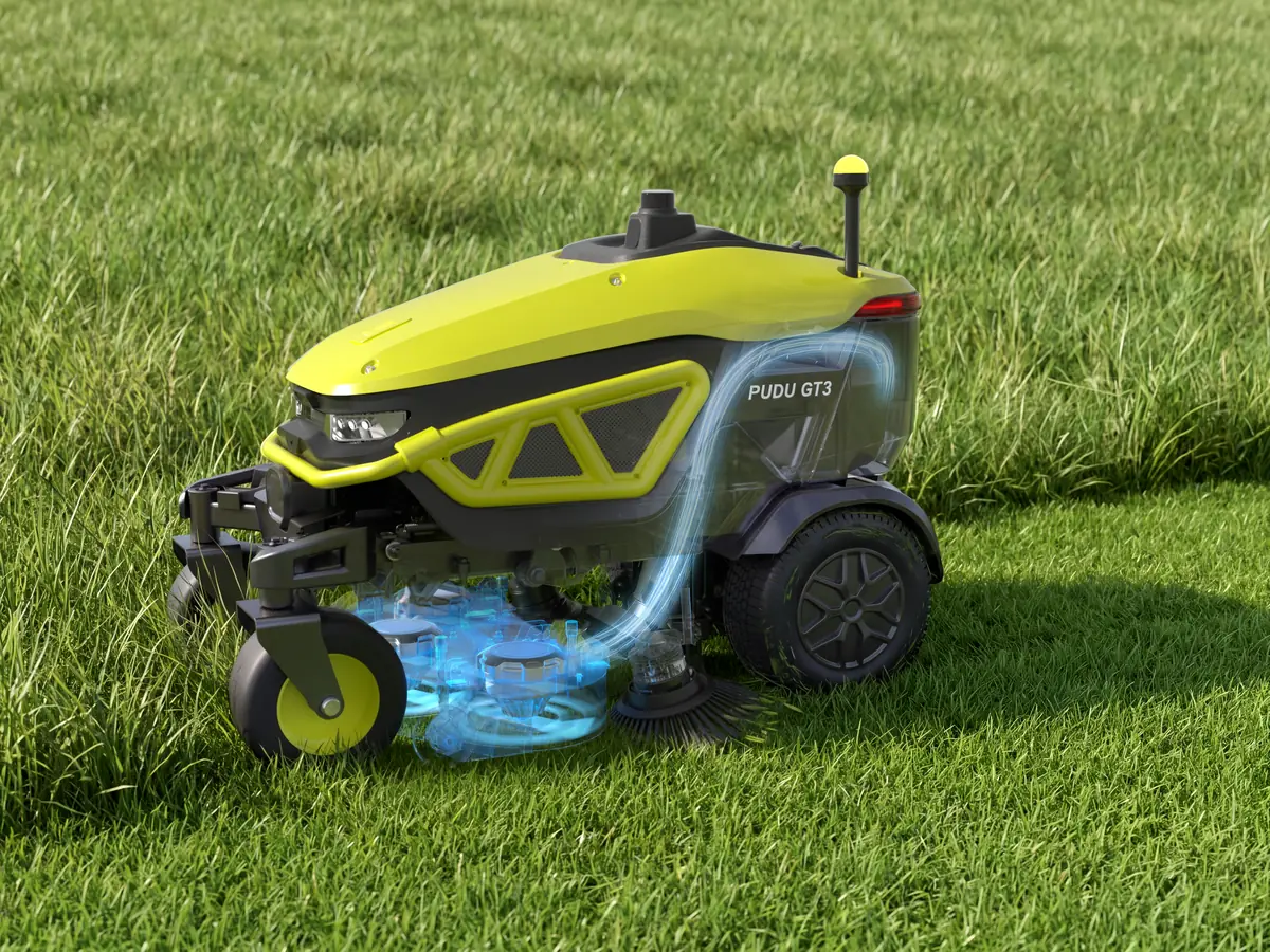 Le PUDU GT3 aspire l'herbe coupée pendant la tonte