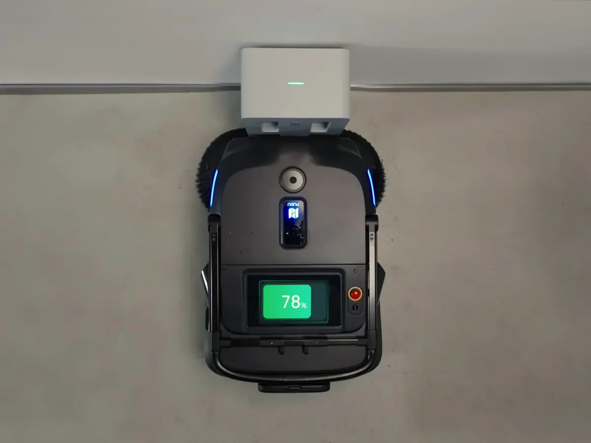The PUDU MT1 at its charging dock